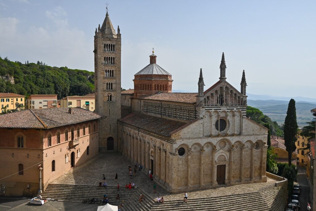 The cathedral of San Cerbone in Massa Marittima's Piazza Garibaldi in warm afternoon light