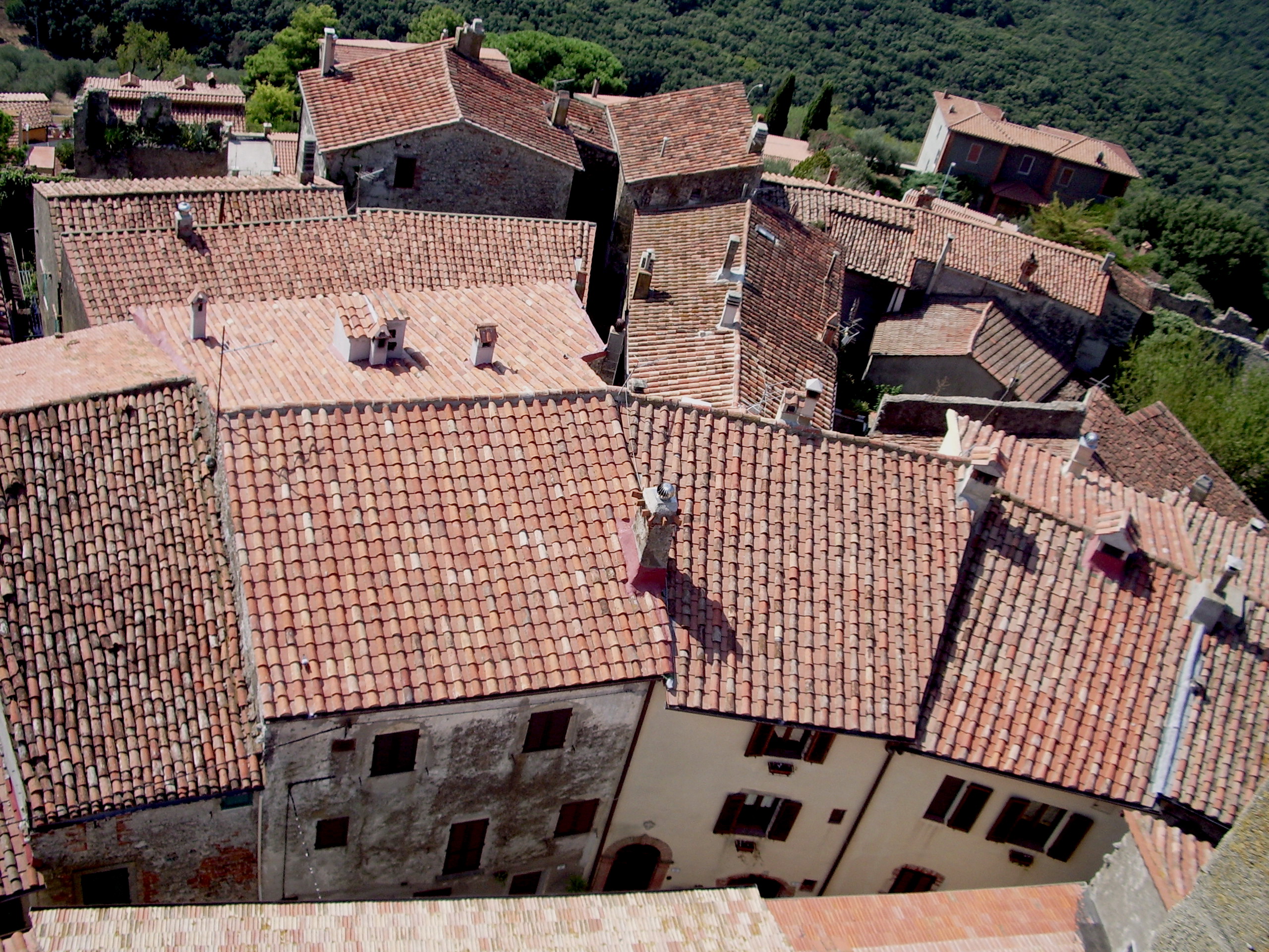 Terracotta rooftops of Capalbio's old town, seen from the tower of the Rocca Aldobrandesca